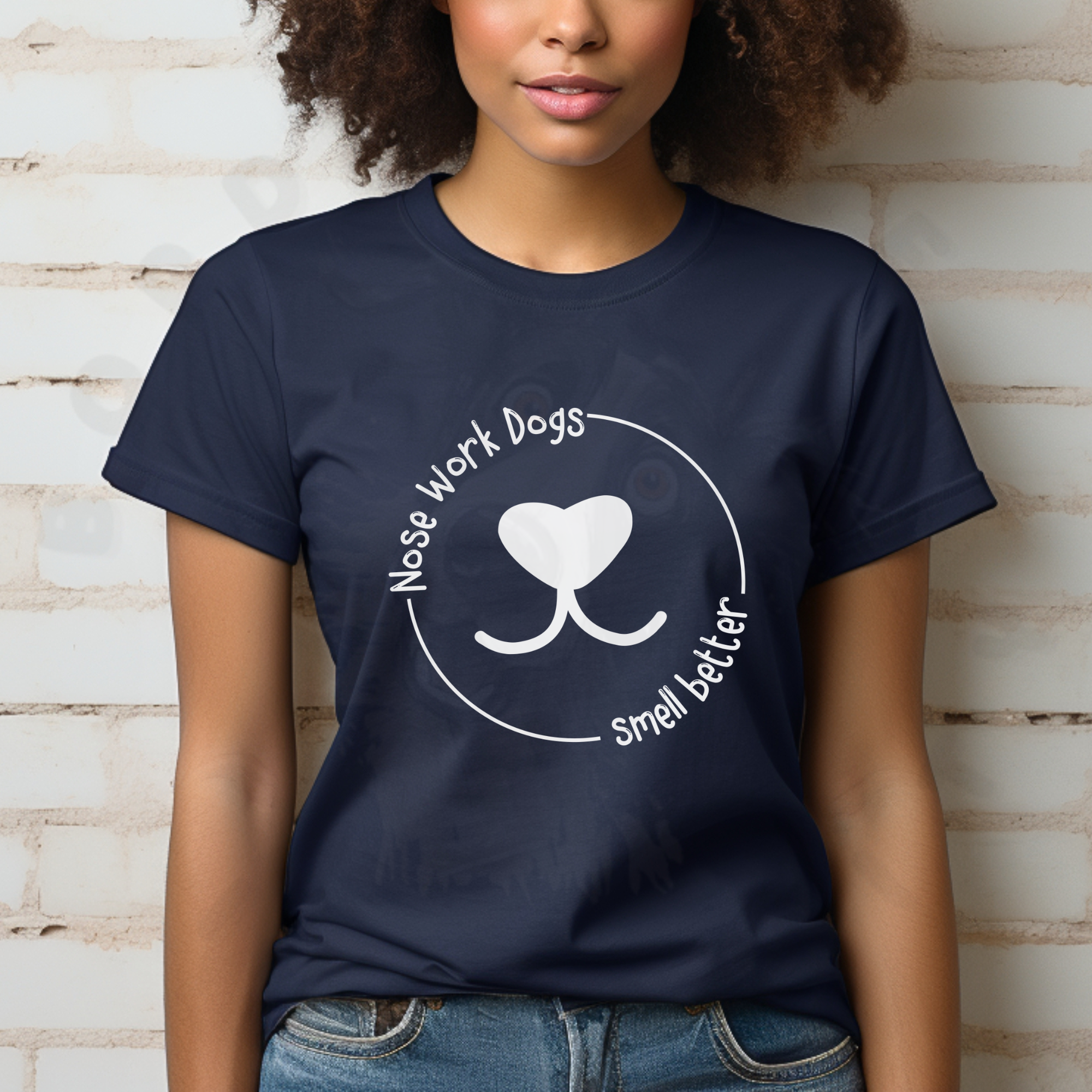 Navy t-shirt with white circular text reading "Nose Work Dogs Smell Better" surrounding a heart-shaped dog nose graphic