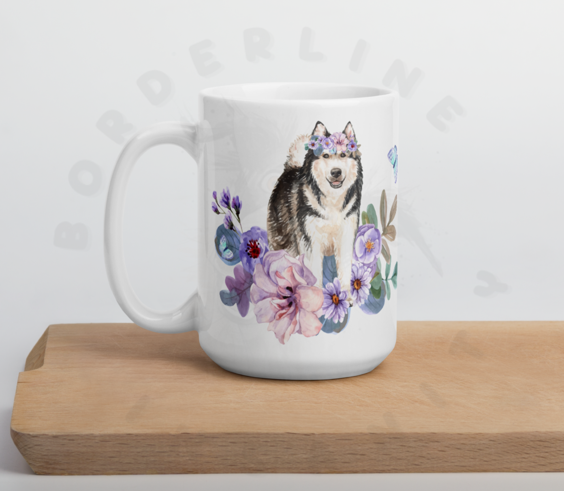 alaskan malamute in flowers mug on a cutting board
