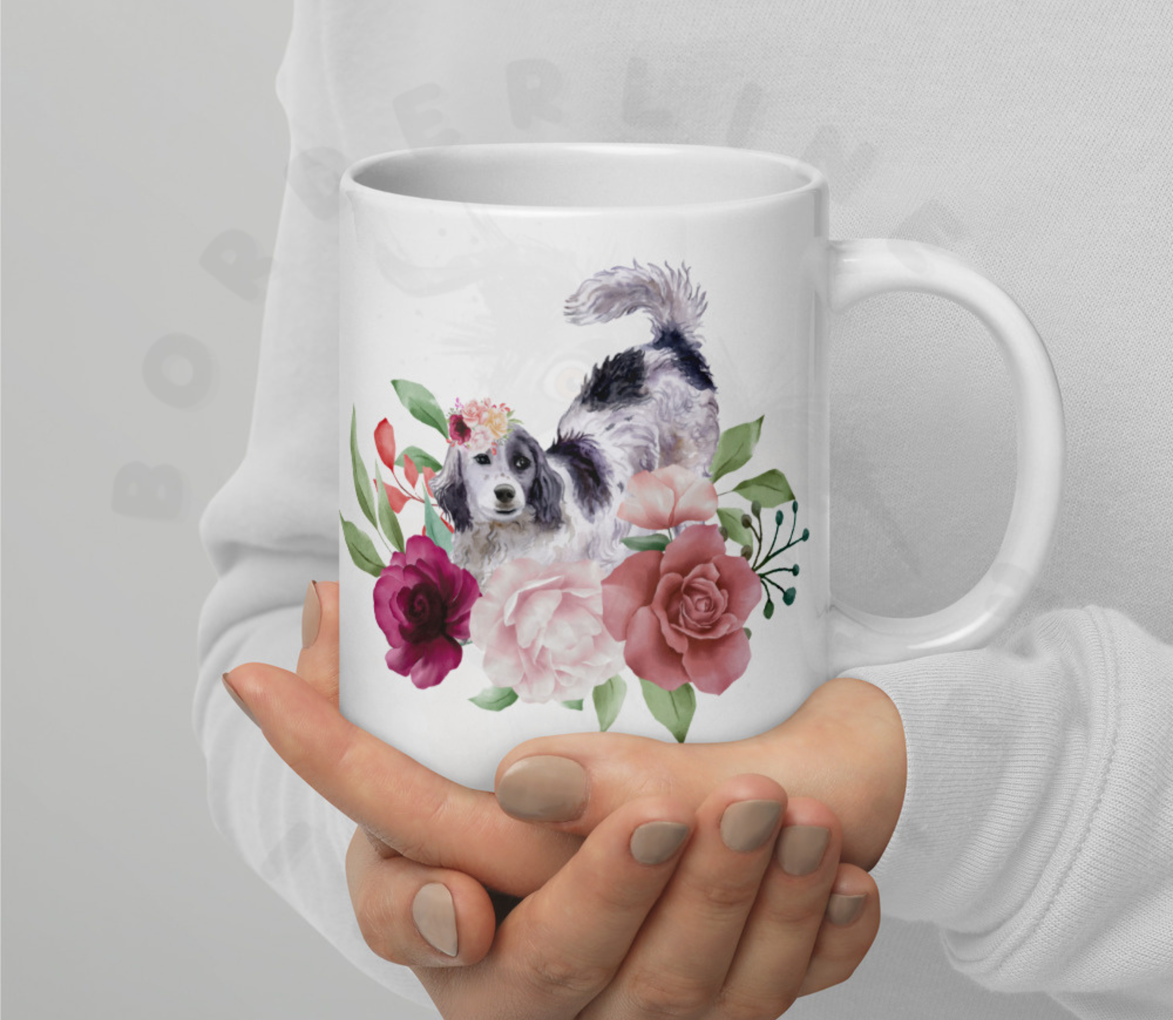 english setter floral ceramic mug with pink roses and watercolor flowers held by a person in a white sweatshirt