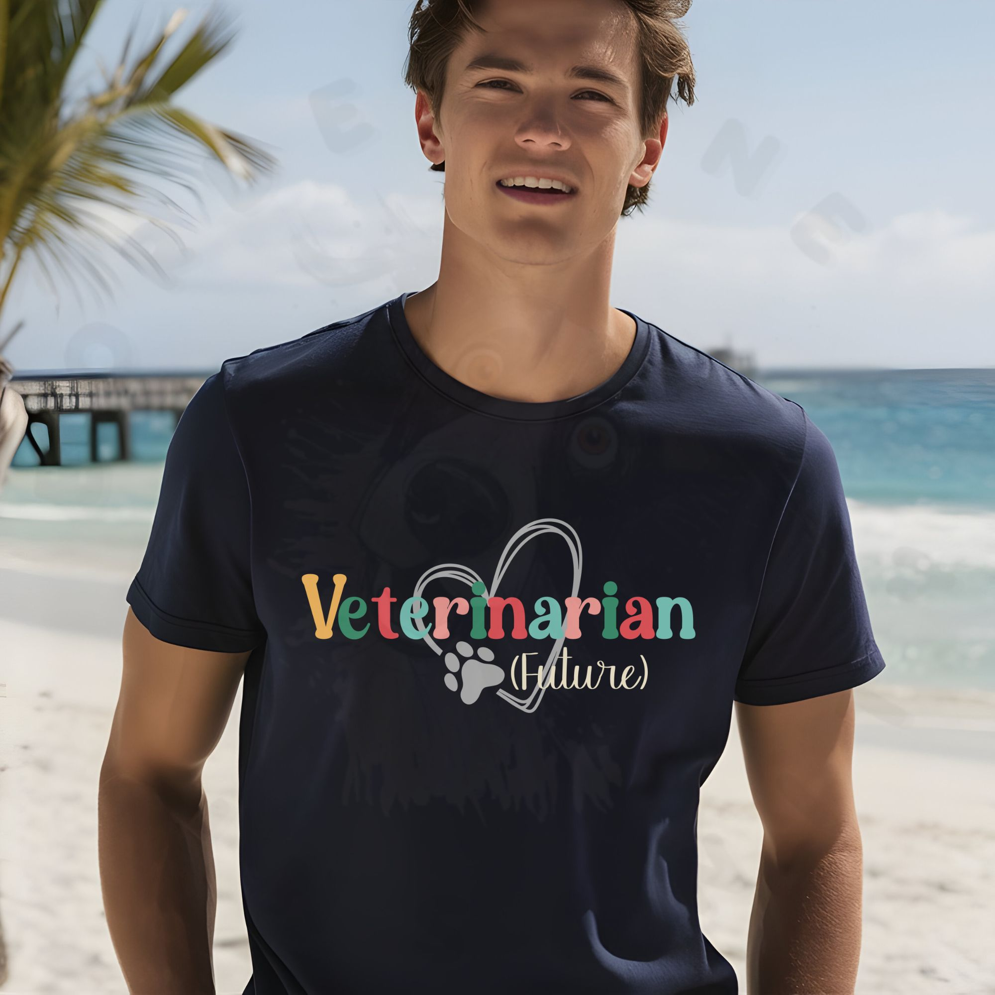 a man standing on a beach wearing a navy future veterinarian tee with a heart and paw print