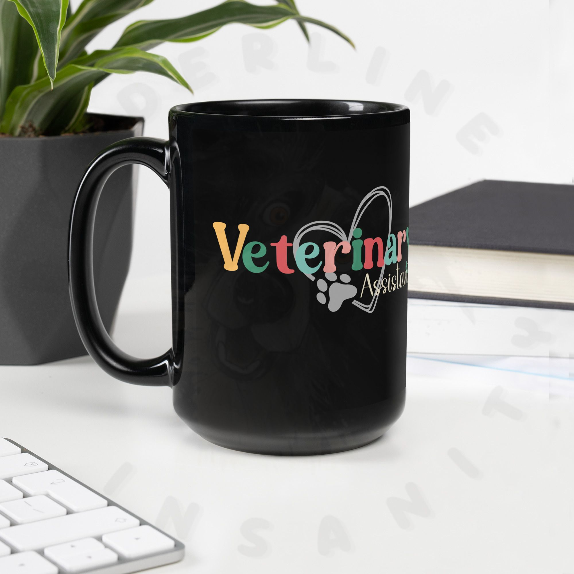 15oz black ceramic veterinary assistant mug on a desk with a plant and keyboard
