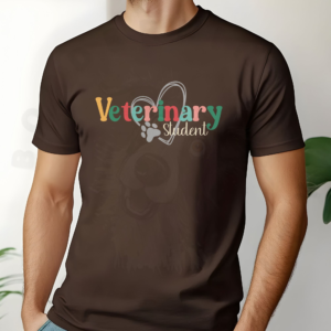 a man standing in front of a white background with plants wearing a brown veterinary student tee with a heart and paw print