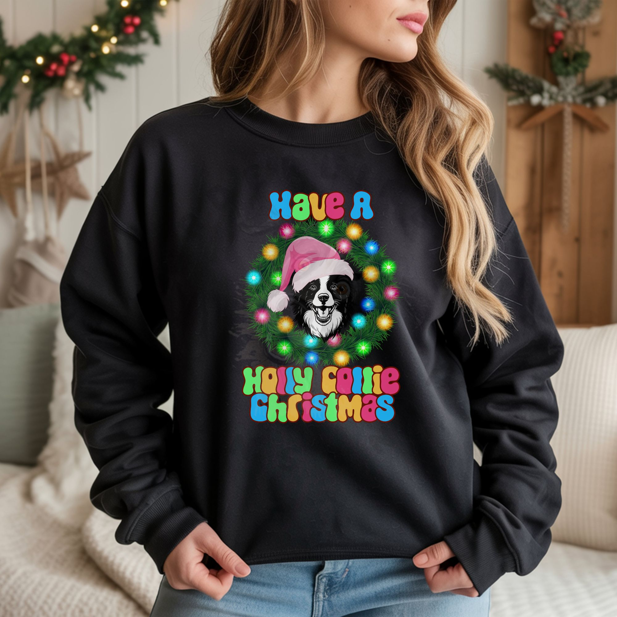 a woman leaning on a truck bed wearing a orange halloween sweatshirt that features 5 dogs dressed as ghosts with a crescent moon, jack-o-lanterns, and bats that says spooky season in cursive