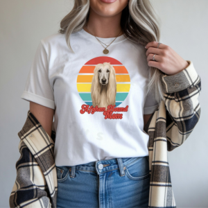 a woman wearing a white tee that features a retro sunset graphic with an afghan hound and the words afghan hound mom in retro script