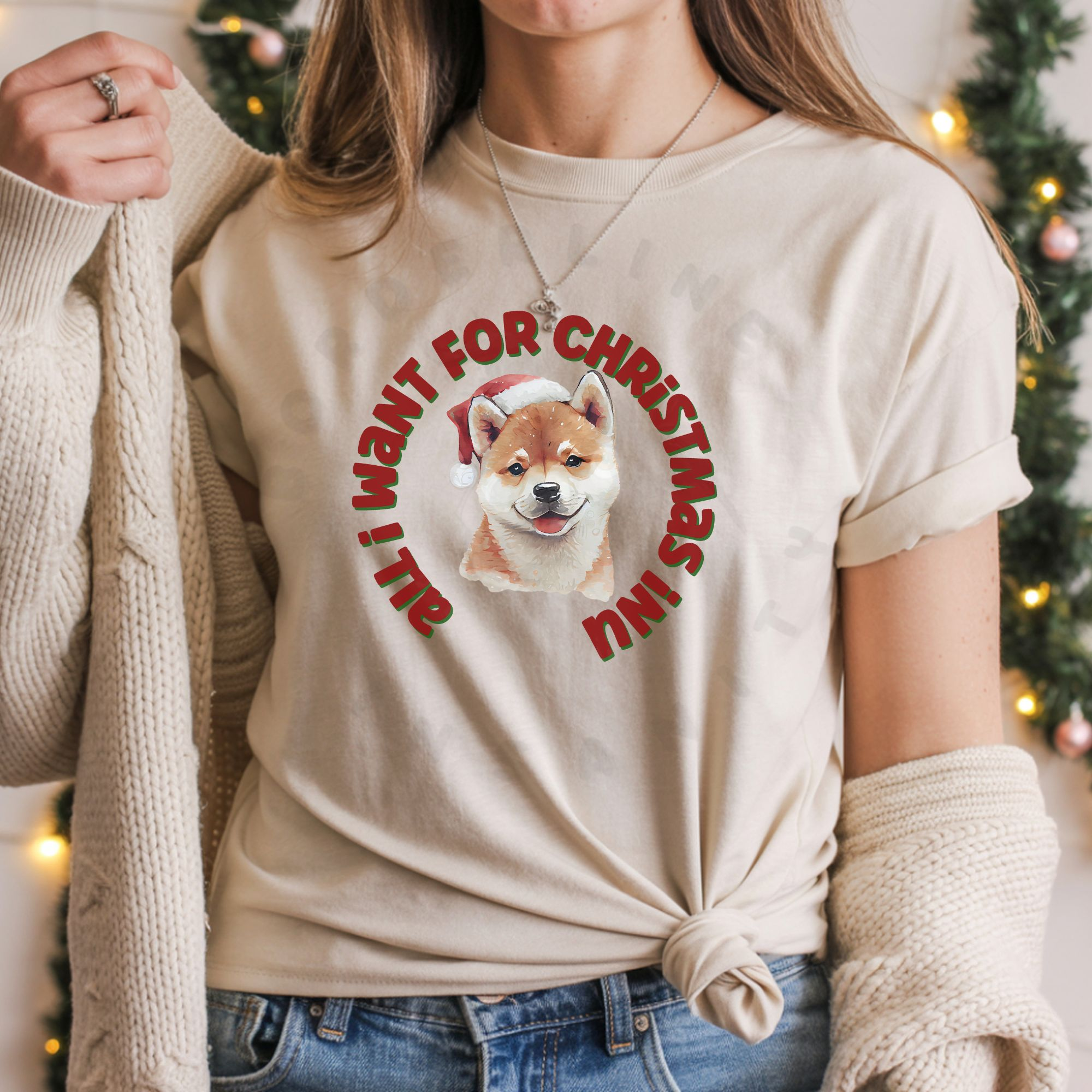 Watercolor Shiba Inu in Santa hat with circular All I Want for Christmas Inu text on t-shirt