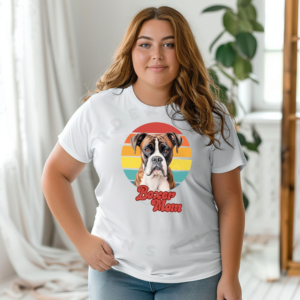 a woman wearing a white tee featuring a retro sunset design and a boxer with the words boxer mom in retro script