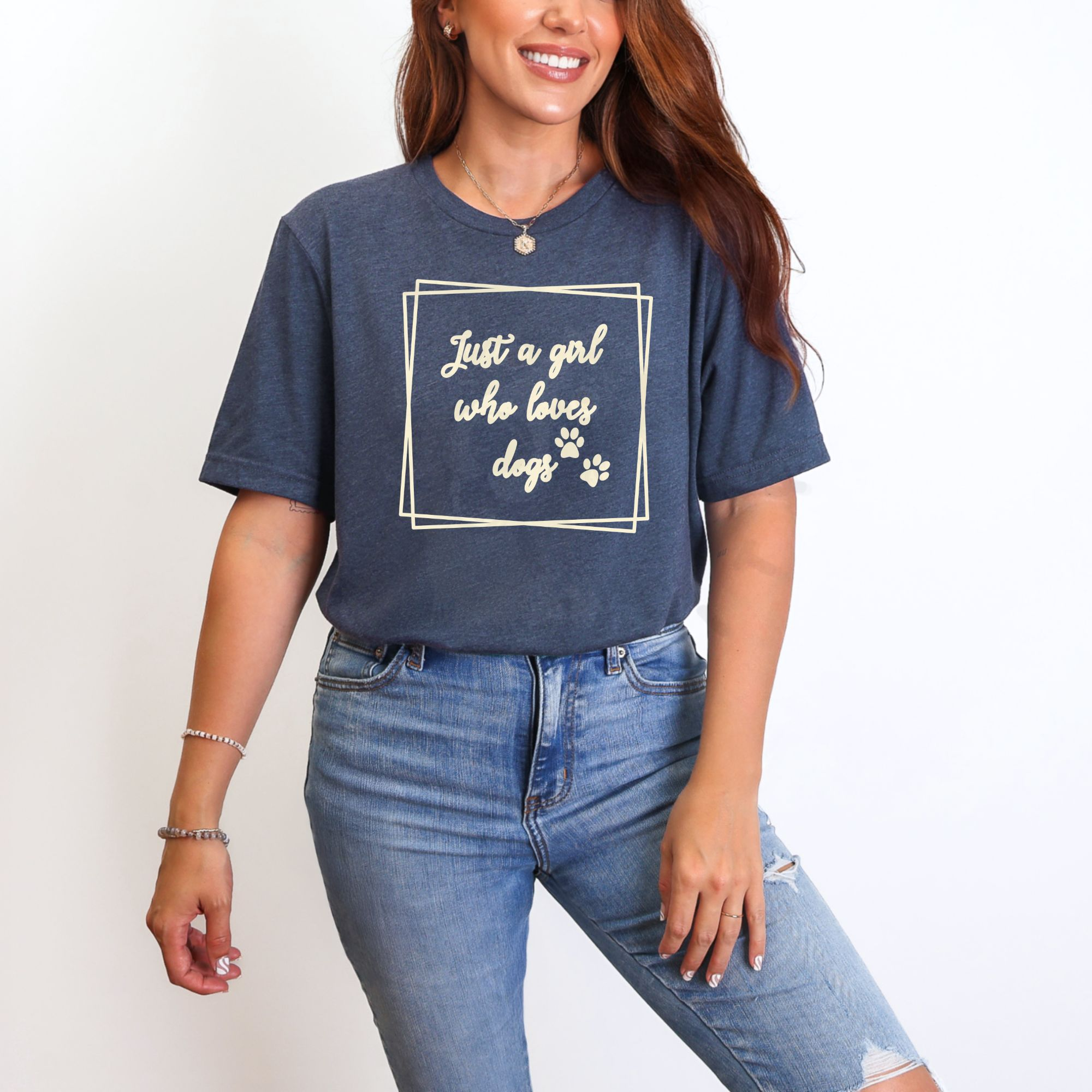 ust a girl who loves dogs text with paw prints in sketchy frame on heather navy t-shirt
