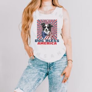 a woman wearing a white tank with a patriotic background and an image of a border collie in an american flag bandana and sunglasses that says dog bless america