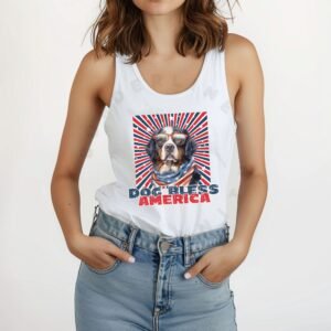 a woman wearing a white tank with a patriotic background and an image of a bernese mountain dog in an american flag bandana and sunglasses that says dog bless america