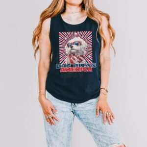 a woman wearing a navy tank with a patriotic background and an image of a maltese in an american flag bandana and sunglasses that says dog bless america