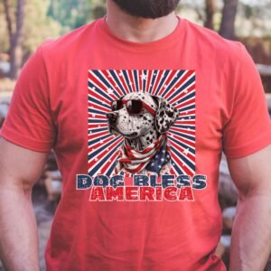 a man wearing a heather red tee with a patriotic background and an image of a dalmatian in an american flag bandana and sunglasses that says dog bless america