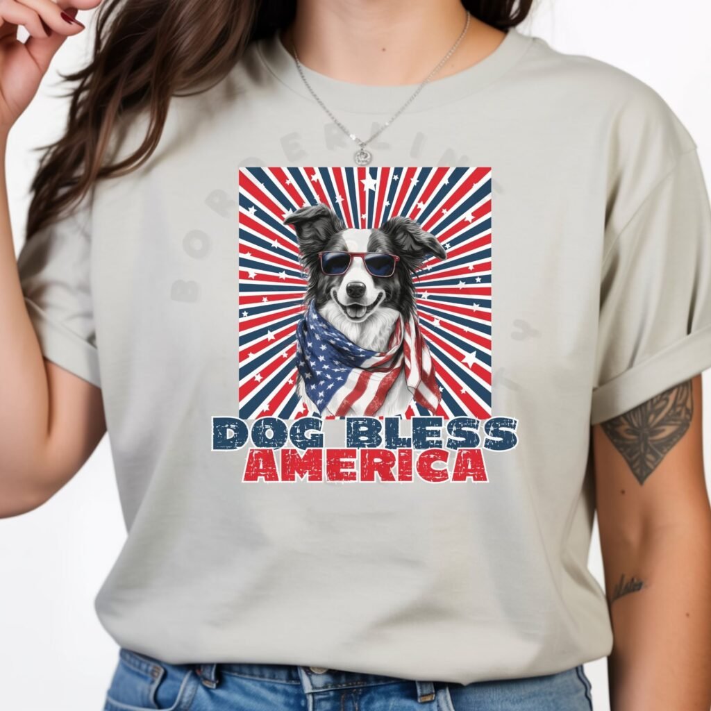 a woman wearing a silver tee with a patriotic background and an image of a border collie in an american flag bandana and sunglasses that says dog bless america